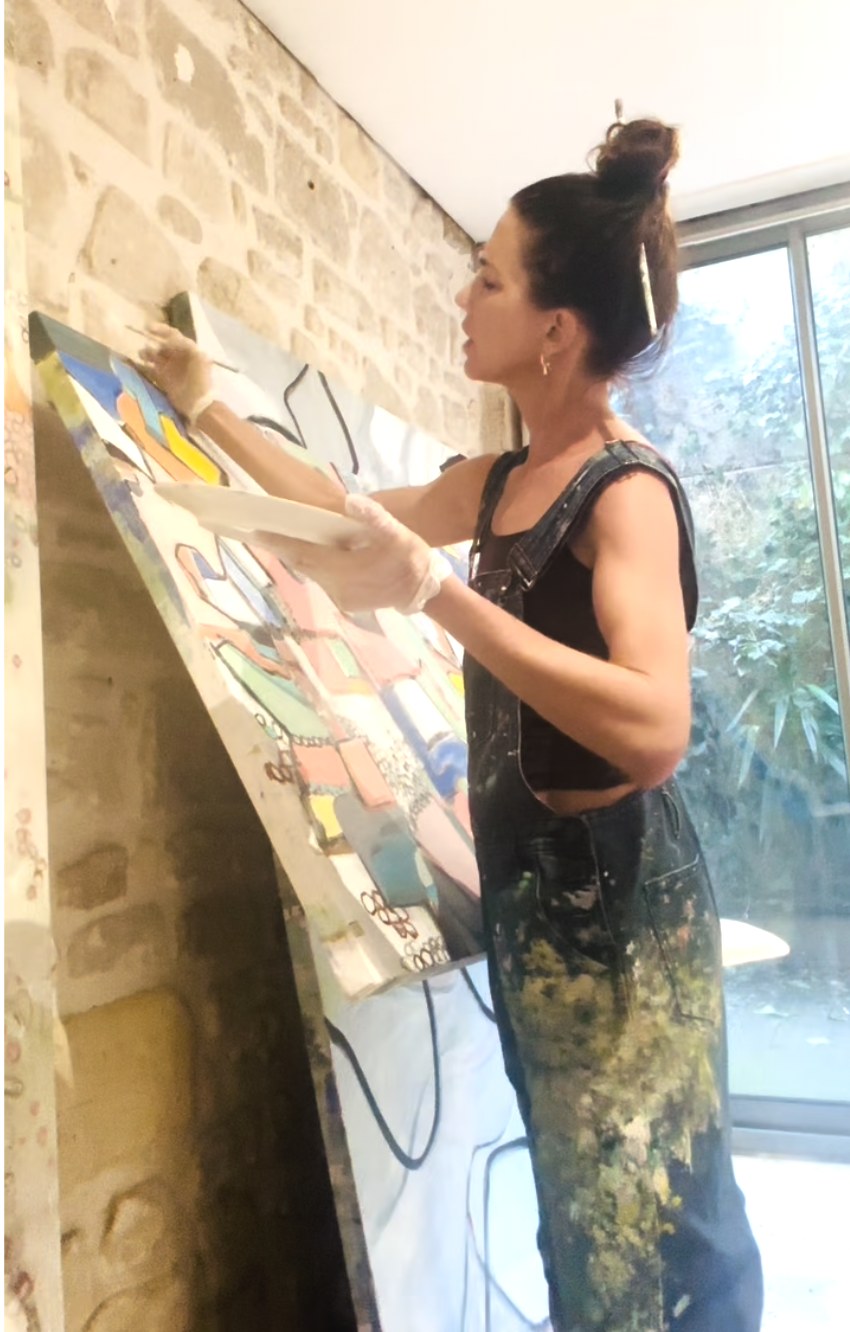 Catherine painting in her Paris atelier
